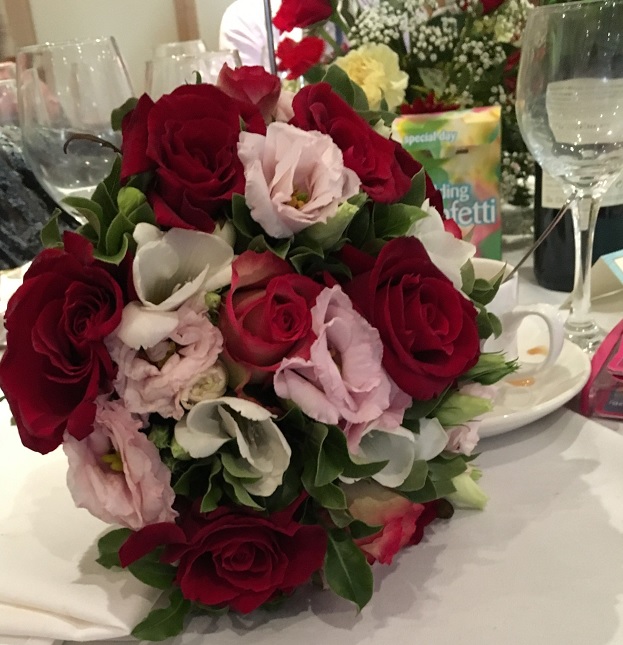Red, pink and white wedding bouquet